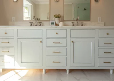 Custom vanity by Oak Ridge Builders with two mirrors