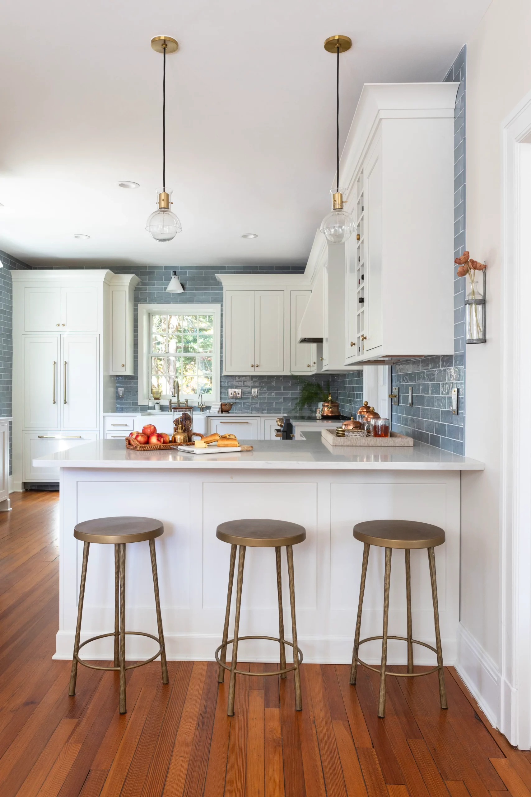 West Haven, Maryland Kitchen Renovation view of barstools and island with Ivory Stone Interiors