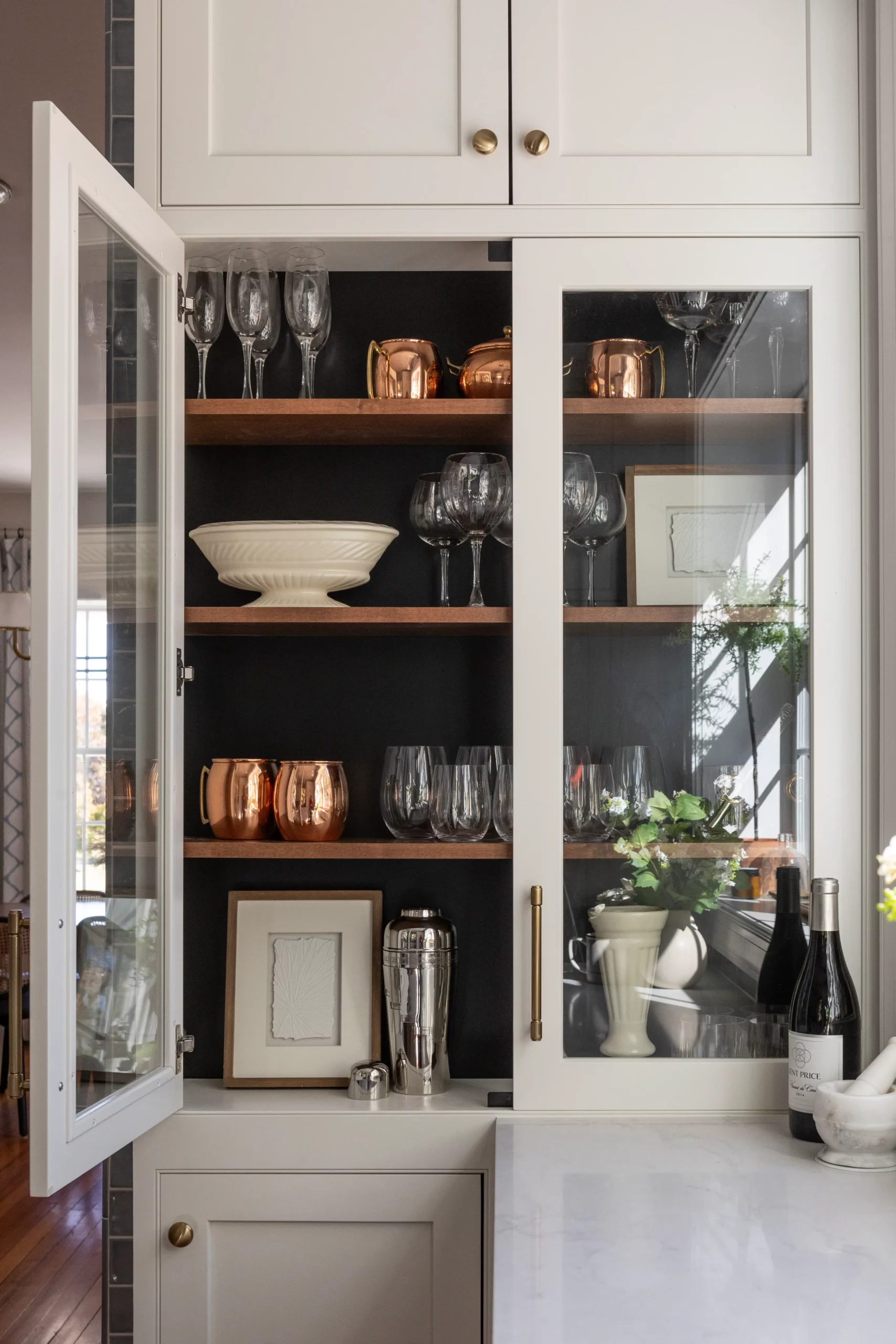 Glass cabinet detail from a West Haven, Maryland kitchen renovation with Ivory Stone Interiors