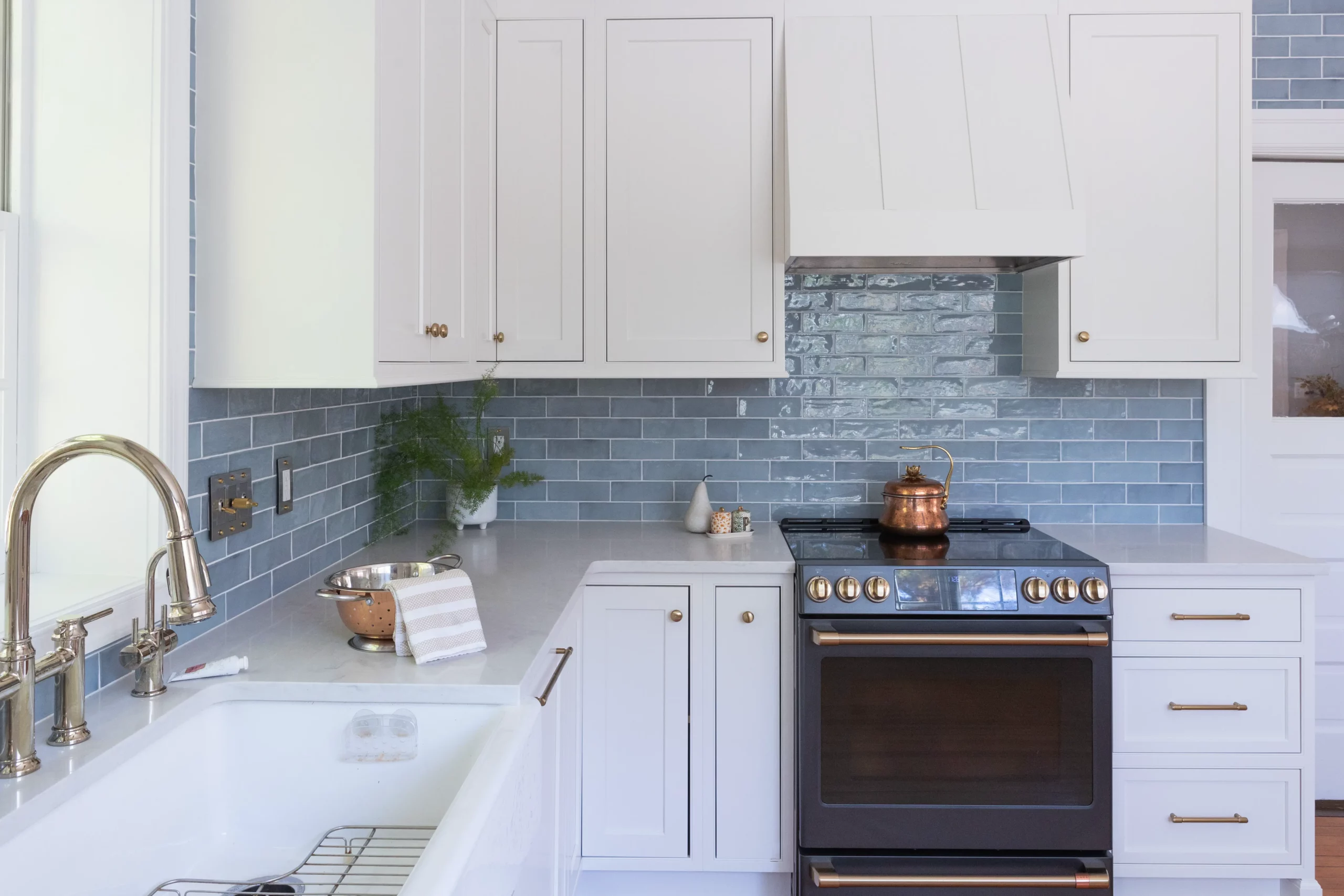 West Haven, Maryland Kitchen Renovation with Ivory Stone Interiors view of Stove and Kitchen Sink